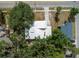 Aerial view of the house showing its roof, surrounding trees, and proximity to the neighborhood streets at 2026 Cocoanut Ave, Sarasota, FL 34234