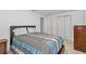Comfortable bedroom with tile floors, neutral paint, and natural light from the window at 2026 Cocoanut Ave, Sarasota, FL 34234