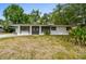 Charming single-story home featuring a double-door entry and well-maintained landscaping at 2026 Cocoanut Ave, Sarasota, FL 34234
