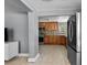 A well-equipped kitchen with stainless steel appliances and tiled flooring at 2026 Cocoanut Ave, Sarasota, FL 34234