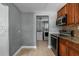 A view from the kitchen to a laundry room featuring a washing machine and dryer at 2026 Cocoanut Ave, Sarasota, FL 34234