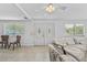 Bright living area features double front doors with decorative glass and tile floors at 2026 Cocoanut Ave, Sarasota, FL 34234