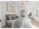 Light filled bedroom with gray and white color palette, work desk and connecting bathroom at 2104 4Th S St, St Petersburg, FL 33705