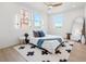 Bedroom with light and airy feel, featuring large rug and many windows at 2104 4Th S St, St Petersburg, FL 33705