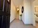 Bright and inviting entryway with tile floors, modern decor, and an open staircase at 2104 4Th S St, St Petersburg, FL 33705