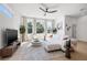 Bright living room with lots of natural light from the large windows with a neutral color palette at 2104 4Th S St, St Petersburg, FL 33705