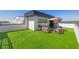 Beautiful rooftop deck with artificial turf and outdoor seating area, perfect for relaxing at 2104 4Th S St, St Petersburg, FL 33705