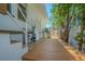 View of a deck with a storage shed; miscellaneous storage items can be seen on the deck at 2114 S Venus St, Tampa, FL 33629