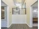 A two-story foyer with a staircase and views into other rooms on either side at 2114 S Venus St, Tampa, FL 33629