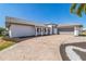 Beautiful modern home with attached two car garage and a spacious driveway at 2161 Aqui Esta Dr, Punta Gorda, FL 33950