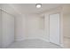 Bedroom featuring white marble floors, a closet, and a window with light-blocking blinds at 2167 Corfell St, Port Charlotte, FL 33948