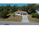 Charming single-story home with a well-manicured front yard and attached garage providing curb appeal at 2167 Corfell St, Port Charlotte, FL 33948