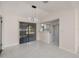 Bright living room with sliding glass doors, backyard view and marble floors at 2167 Corfell St, Port Charlotte, FL 33948
