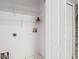 Laundry area featuring tile flooring, open shelving, and washer/dryer hookups at 2306 Lake Woodberry Cir, Brandon, FL 33511