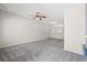 Spacious living room with carpet flooring and ceiling fan at 2306 Lake Woodberry Cir, Brandon, FL 33511