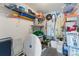 Well-organized storage room with shelves, hooks, and ample space for household items and tools at 2373 Hounds Trl, Palm Harbor, FL 34683