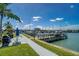 Community dock with picnic tables and barbeque pits and beautiful ocean views at 250 Medallion Blvd # H, Madeira Beach, FL 33708