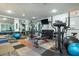 Community fitness center with weights, machines, mirrors, and bright lighting at 250 Medallion Blvd # H, Madeira Beach, FL 33708