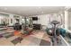 Well-equipped gym featuring various exercise machines, weights, and mirrored walls for a complete fitness experience at 250 Medallion Blvd # H, Madeira Beach, FL 33708