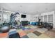 Bright gym with updated machines, free weights, and mirrored walls for a full body workout at 250 Medallion Blvd # H, Madeira Beach, FL 33708