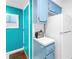 Kitchen area featuring a white refrigerator, cabinets, and a toaster at 250 Medallion Blvd # H, Madeira Beach, FL 33708
