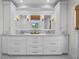 Elegant bathroom with double vanity, marble countertops, and decorative lighting at 2523 W Sunset Dr, Tampa, FL 33629