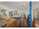Bright and stylish living room with hardwood floors and elegant decor, viewed from entryway at 2523 W Sunset Dr, Tampa, FL 33629