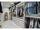 Spacious walk-in closet with custom shelving and ample storage space at 2523 W Sunset Dr, Tampa, FL 33629