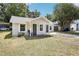 Attractive single-story home featuring a fresh exterior paint and neat front yard at 2604 Oakdale St, Seffner, FL 33584