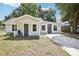 Charming single-story home with a well-maintained lawn and inviting front porch at 2604 Oakdale St, Seffner, FL 33584