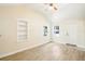 Inviting living room with a built-in shelving unit and views of the outdoors at 2604 Oakdale St, Seffner, FL 33584