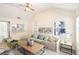 Comfortable living room with vaulted ceilings, filled with natural light and neutral decor at 2604 Oakdale St, Seffner, FL 33584