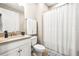 Clean, bright bathroom features a tub and shower combo, with fresh white towels and modern fixtures at 2644 Leafwing Ct, Palm Harbor, FL 34683
