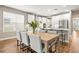 Bright dining area with views of the kitchen and the rest of the house at 2644 Leafwing Ct, Palm Harbor, FL 34683