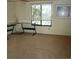Spacious bedroom with large window offering natural light and a serene view, perfect for relaxation at 2737 Enterprise E Rd # 122, Clearwater, FL 33759