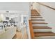 Spacious living area blending seamlessly with the kitchen and staircase, creating an open and airy atmosphere at 310 S Delaware Ave # F, Tampa, FL 33606