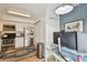 Living Room featuring Kitchen, and access to an adjacent room at 310 S Delaware Ave # F, Tampa, FL 33606