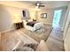 Comfortable bedroom features great lighting, ceiling fan, and elegant decor at 3529 Tanglewood Trl, Palm Harbor, FL 34685