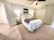 Spacious main bedroom featuring modern decor, ceiling fan, and a closet at 3529 Tanglewood Trl, Palm Harbor, FL 34685