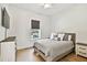 Bedroom features hardwood floors, neutral color palette and modern furnishings at 3905 W San Obispo St, Tampa, FL 33629