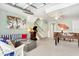 Finished basement featuring game area with a foosball table and lounge seating at 412 80Th St, Holmes Beach, FL 34217