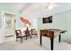 Basement game area featuring foosball table, wall decor, and seating area at 412 80Th St, Holmes Beach, FL 34217