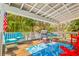 Spacious deck with outdoor dining area and grill, perfect for enjoying the tropical views at 412 80Th St, Holmes Beach, FL 34217