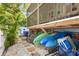 Convenient under-house storage with kayaks, bikes, and beach gear, perfect for outdoor enthusiasts at 412 80Th St, Holmes Beach, FL 34217