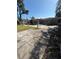 View of backyard concrete and tile patio leading to the back of the house at 4218 Carson Ne St, St Petersburg, FL 33703