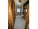 Bathroom features modern tile, toilet, window, and exposed beams, ready to be renovated at 4218 Carson Ne St, St Petersburg, FL 33703