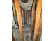 Unfinished hallway with exposed framing and utilities, providing a view of the construction process at 4218 Carson Ne St, St Petersburg, FL 33703