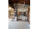 Unfinished interior space with exposed framing and ductwork, offering a glimpse into the home's structure at 4218 Carson Ne St, St Petersburg, FL 33703