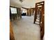 Spacious living room with exposed beams, ready for renovation and personalization at 4218 Carson Ne St, St Petersburg, FL 33703