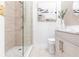 Modern bathroom featuring sleek vanity, contemporary fixtures, and a glass-enclosed shower at 4822 Hamlets Grove Dr, Sarasota, FL 34235